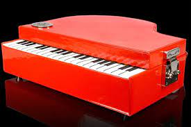 red piano makeup case