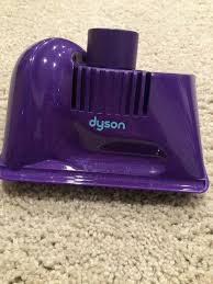 purple dyson zorb groomer tool