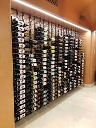 to ceiling metal wine rack display
