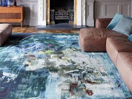 ten rugs to add colour and comfort to