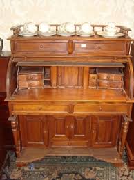 Essays in revaluation, david cecil writes her books are not about men like dickens', nor about man bronte's strength is her ability to describe and make the reader feel what is happening. Lot Art Victorian Style Roll Top Writing Desk
