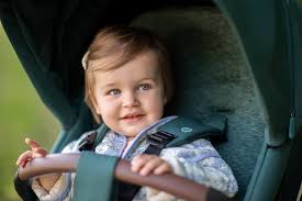 child face forward in a pushchair