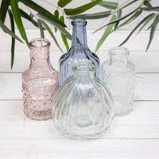 Set Of 4 Vintage Ribbed Glass Bottles