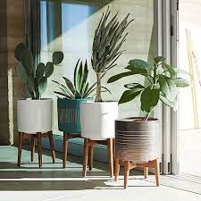 4.7 out of 5 stars 651. Mid Century Turned Wood Planters Solid White Modern Plant Stand Planter Stand Home Decor