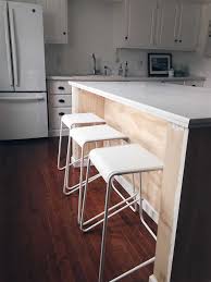 Build a platform to raised the wall cabinets up to the correct height and cover with toe kick at the bottom. Rachel Schultz A Diy Kitchen Island