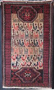 antique rugs from uk dealers on display