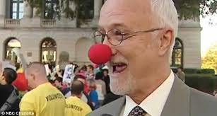 Political satire: City council member John Autry sports a clown nose - article-2232138-15FF40AB000005DC-238_634x339