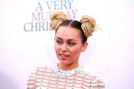 miley cyrus on a red carpet again