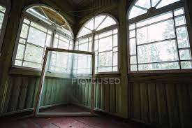 Window Frame With Glass Near Walls In
