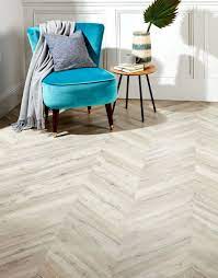 Wood flooring is another popular option, and it looks great in many rooms. Chevron Natural Oak Laminate Flooring Flooring Superstore