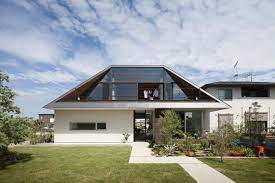 House With A Large Hipped Roof House