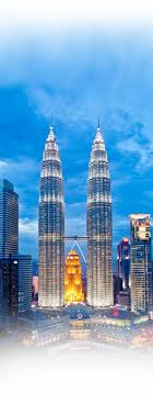 The petronas towers, also known as the petronas twin towers are twin skyscrapers in kuala lumpur, malaysia. The Petronas Twin Towers