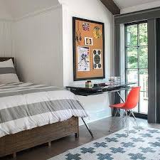 Black walls do not take away youthfulness from the kid's room; Black Framed Kids Room Cork Boards Design Ideas