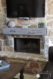 Chalked paint works best for that weathered look. How To Build And Hang A Mantel On A Stone Fireplace Shanty 2 Chic