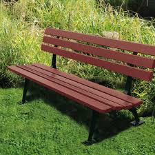 wooden memorial benches with plaque