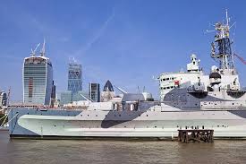 the warship hms belfast docked along