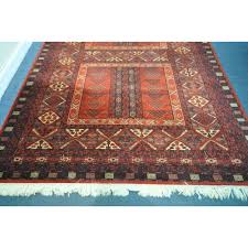 worsted wool red ground rug 366cm x