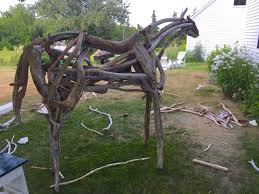 sculpture in driftwood grappa lane