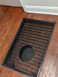 a c floor return vent partially covered