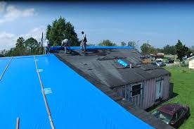 tarping a damaged roof blue tarp