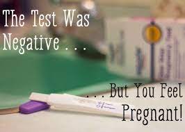 pregnancy symptoms with a negative test