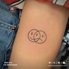 meanings behind smiley face tattoo designs