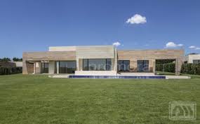 Large gardens with detailed landscaping including lakes. 7 Impeccable Luxury Villas Located In La Finca North West Madrid