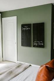 our sage green guest bedroom with