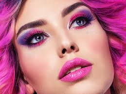 young woman with bright pink makeup