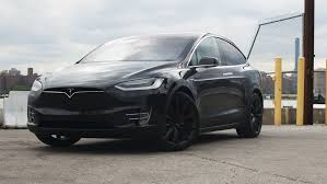 tesla s silly falcon wing doors have