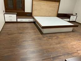 laminate wooden flooring tile at rs 70