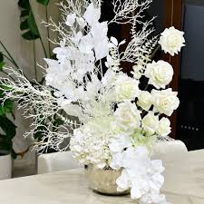 artificial flower arrangement in silver