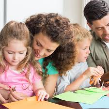 Parents Helping Children With Homework Stock Photo   Getty Images
