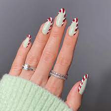7 candy cane nail ideas that aren t cheesy