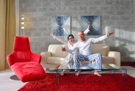 Happy Young Couple Relax At Modern Home