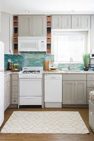 Find gray stock kitchen cabinets at lowe's today. Lowes Diamond Brand Cabinets In Cloud Gray And Colorful Beach Decor Beach Style Kitchen San Diego By Danielle Interior Design Decor Houzz
