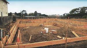 placing a concrete foundation in one