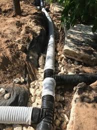 Landscape Drainage Repairs And Lawn