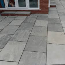 how to clean natural stone paving slabs