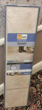 new and sealed pack of floormaster tile