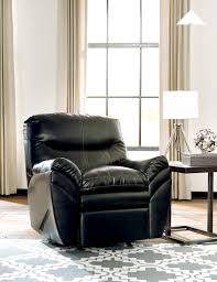 Chairs and recliners are a functional and fashionable aspect of nearly every room in the house. Tassler Black Rocker Recliner By Ashley Furniture Ashleyfurniture Livingroom Recliners Relaxin Living Room Leather Black Furniture Living Room Furniture