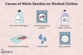 what causes white residue on washed clothes