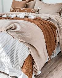 decorate your bed with a throw blanket