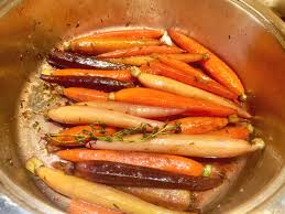glazed rainbow carrots cooking with