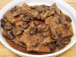 Heat oven to 350°f place meat in a shallow baking pan large enough to hold a single layer. Swiss Steak With Mushrooms And Onions Yeprecipes Com