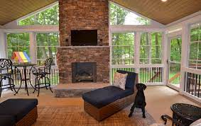Eze Breeze Porch With A Stone Fireplace
