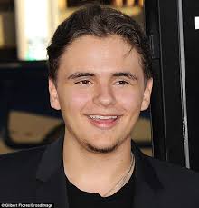 Hairy introductions: Prince Jackson sported the starts of a beard at the final season premiere of True Blood in Hollywood on Tuesday - article-2661090-1EDF68DF00000578-814_634x662