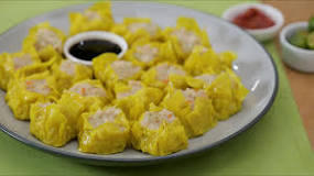 Why is siomai wrapper yellow?