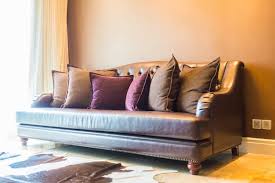 free photo large couch with many cushions