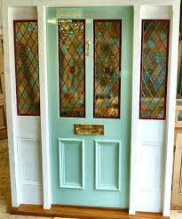 A Stained Glass Front Door With Frame